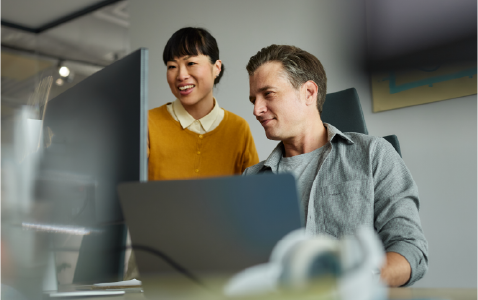 people working on a laptop