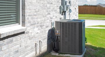a heating and cooling unit outside of a home